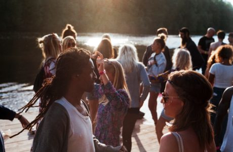 Millennials at a lake by Jens Johnsson on Unsplash